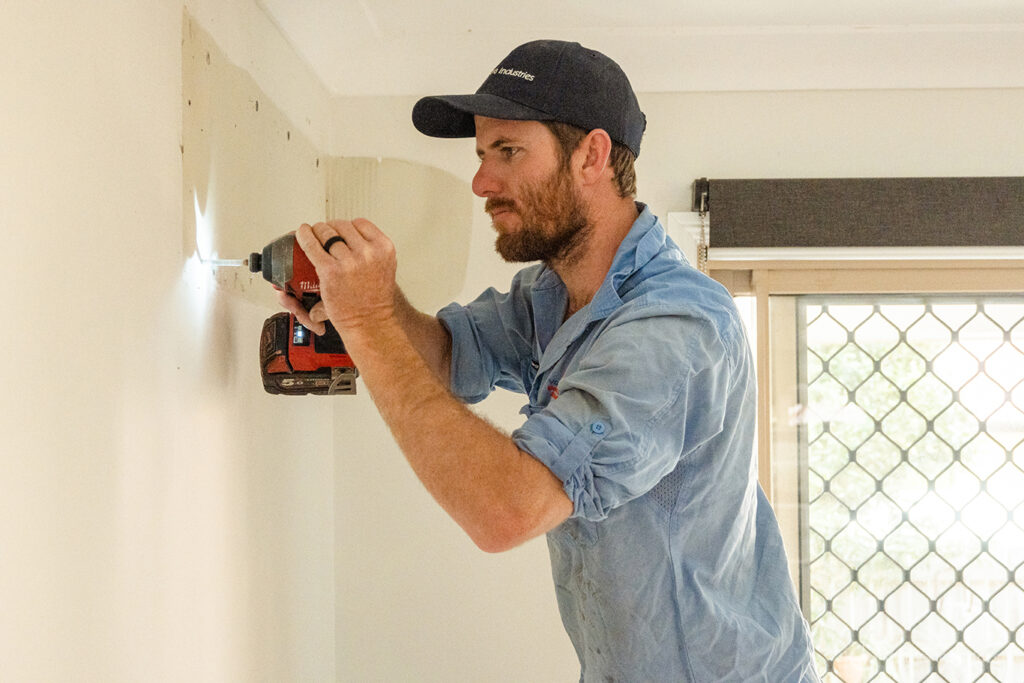 Voltora Industries installing a new Air Conditioner